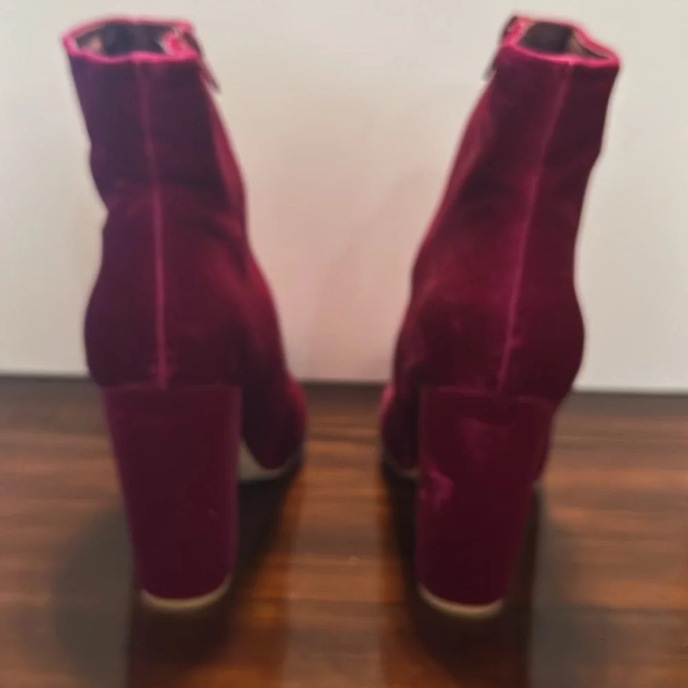 New but tried on Velvet Pink Ankle Boots. Size 9.5. Zip on side. Heel 4”.